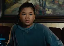 Storm Reid in her sweater, nervously watching the Suicide Squad TV series meme