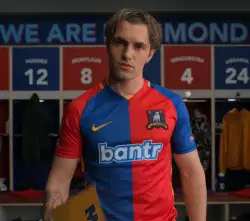 Player Holds Up Sign And Points  