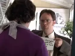 When Dwight shows off his impressive suit jacket meme