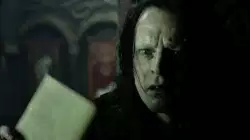 Grima Wormtongue Holds Up Letter 