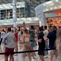 People Get Down At Airport 