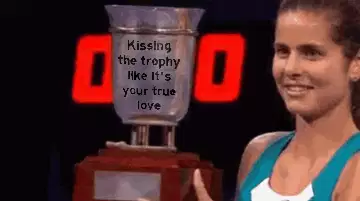 Kissing the trophy like it's your true love meme