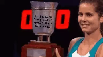 Nothing says 'I'm proud of myself' like a trophy kiss meme