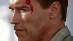 Arnold Schwarzenegger Winks At Camera 