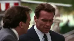 Arnold Schwarzenegger Grabs Man By The Chest 
