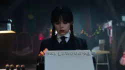 Wednesday Addams Pulls Paper Out Typewriter 