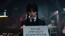 Wednesday Addams: When Wednesday takes a break from studying meme