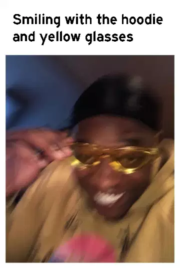 Smiling with the hoodie and yellow glasses meme