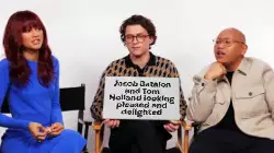 Jacob Batalon and Tom Holland looking pleased and delighted meme