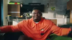 Zion Cheers At The TV